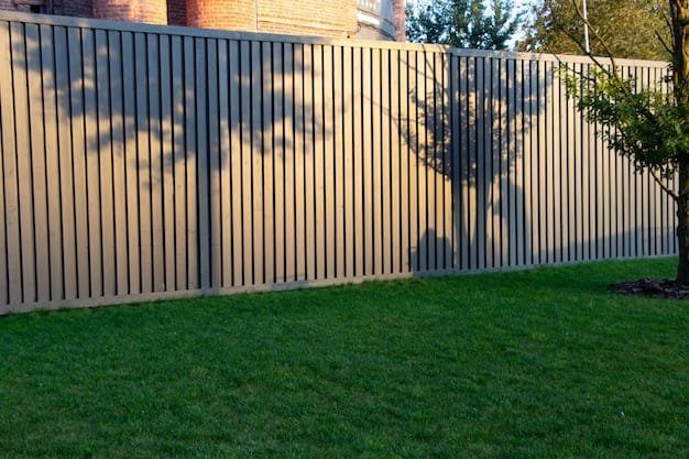 shadows-trees-fence-two-people-one-takes-pictures-other-sitting-lawn_340914-829 Metal privacy fence with a shadow cast on it, highlighting its texture and structure in soft light.